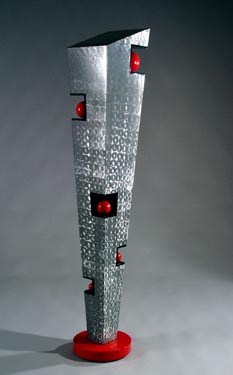 Abstract, contemporary, free standing, metal sculpture made of burnished steel and enamel paints