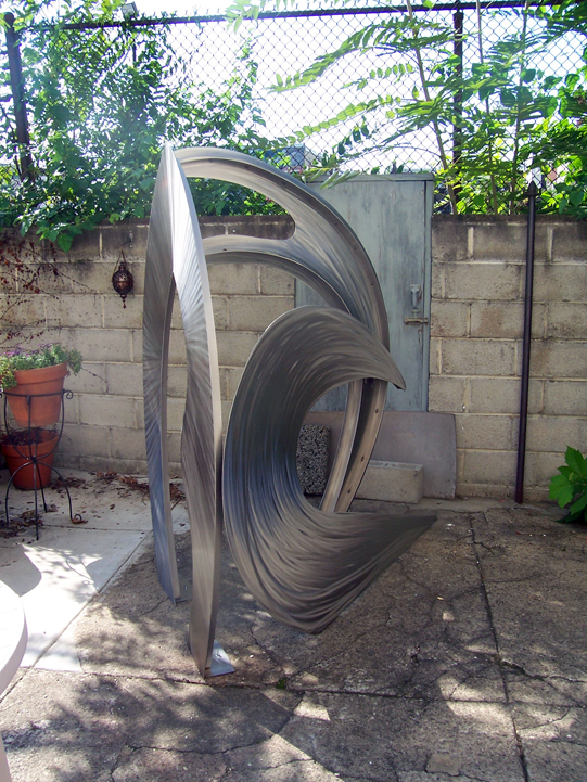 abstract, contemporary, free standing, stainless steel sculpture